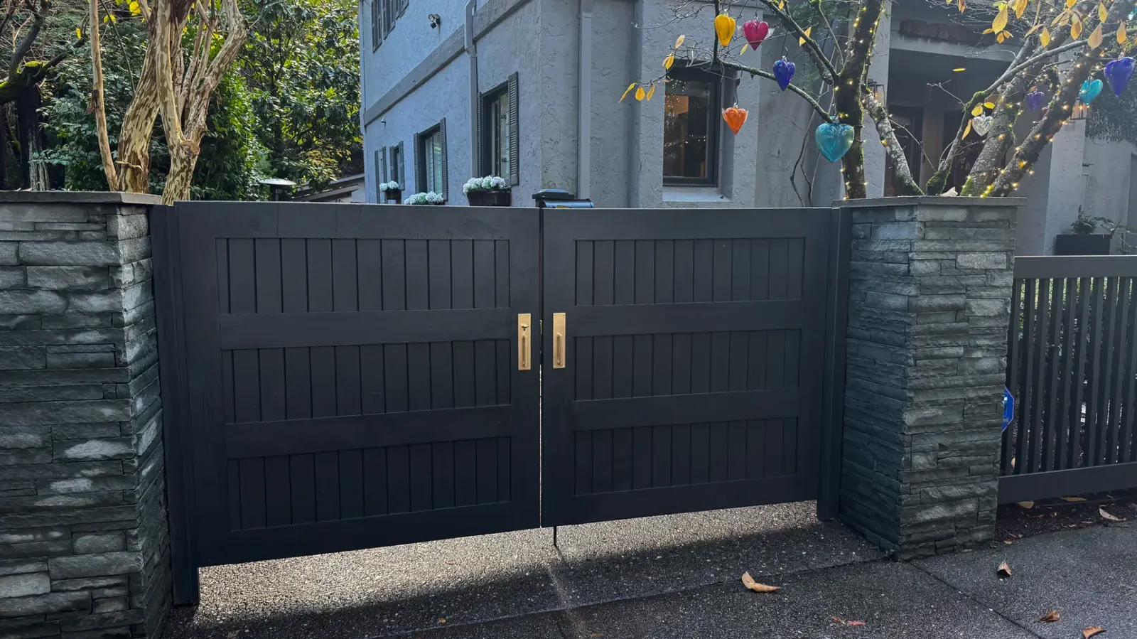 Custom automatic driveway gate at a Pacific Northwest home